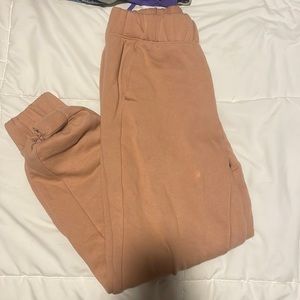 Barley worn peach color sweatpants